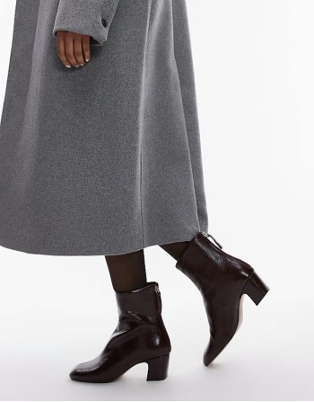 leather heeled boots in burgundy