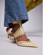 Power studded high heeled shoes in buttermilk