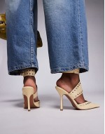 Power studded high heeled shoes in buttermilk
