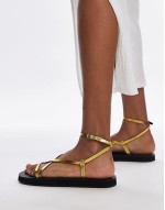 Jules leather minimal strappy flat sandals in gold