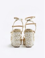 strappy wedge in gold